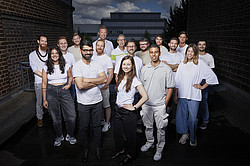 Group of people wearing white tops