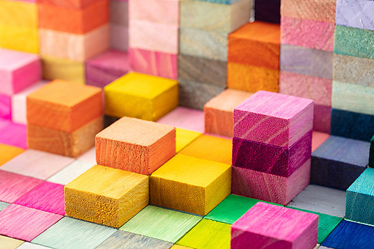 Stacks and layers of colorful wooden blocks