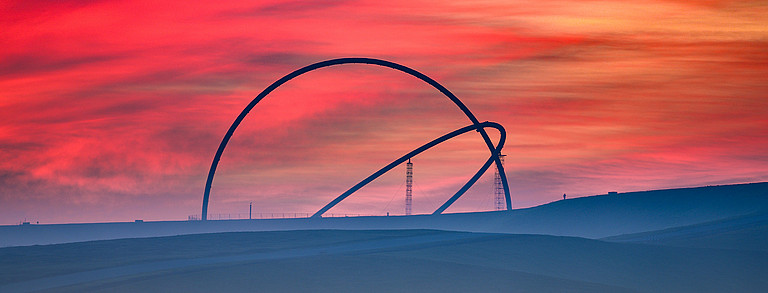Close-up of a landmark in the Ruhr region against a red evening sky