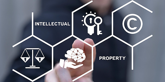 Photo: Graphic illustration on intellectual property featuring symbols for ideas, protection, and law.