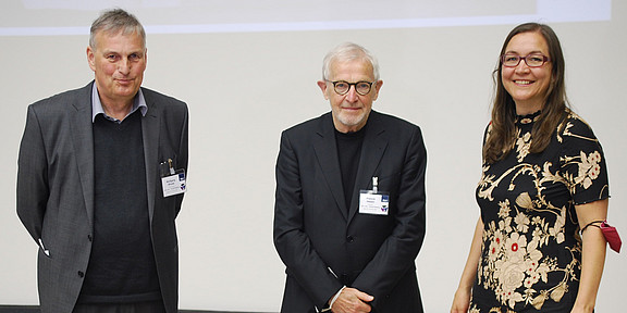 Group photo with three persons
