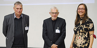 Group photo with three persons