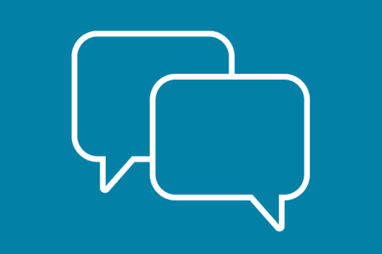 White icon on blue background: two speech bubbles