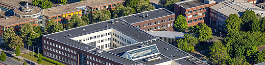 Aerial view of the Dortmund Technology Center with a few streets lined with large, modern office buildings